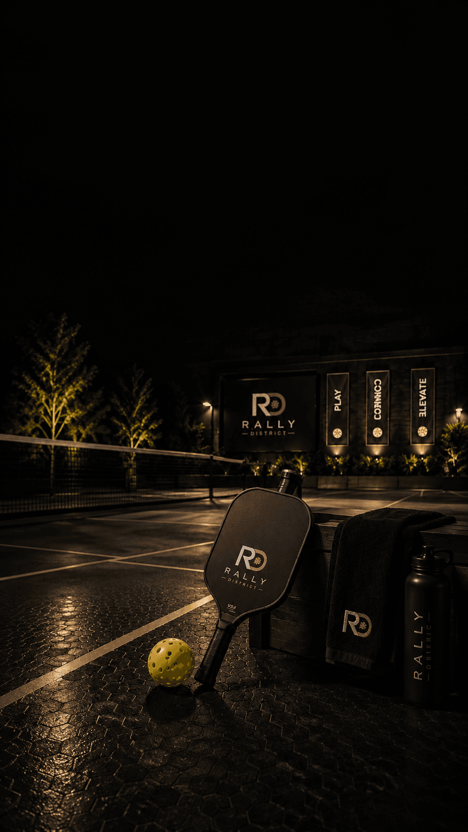 Rally District pickleball court at night